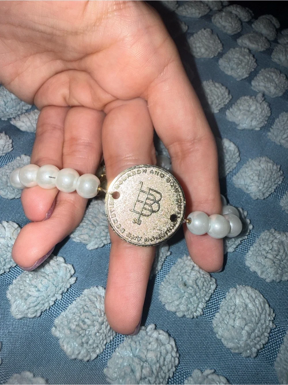 Bourbon and Bowties White Pearl Bead Ring with Silver-Tone Emblem